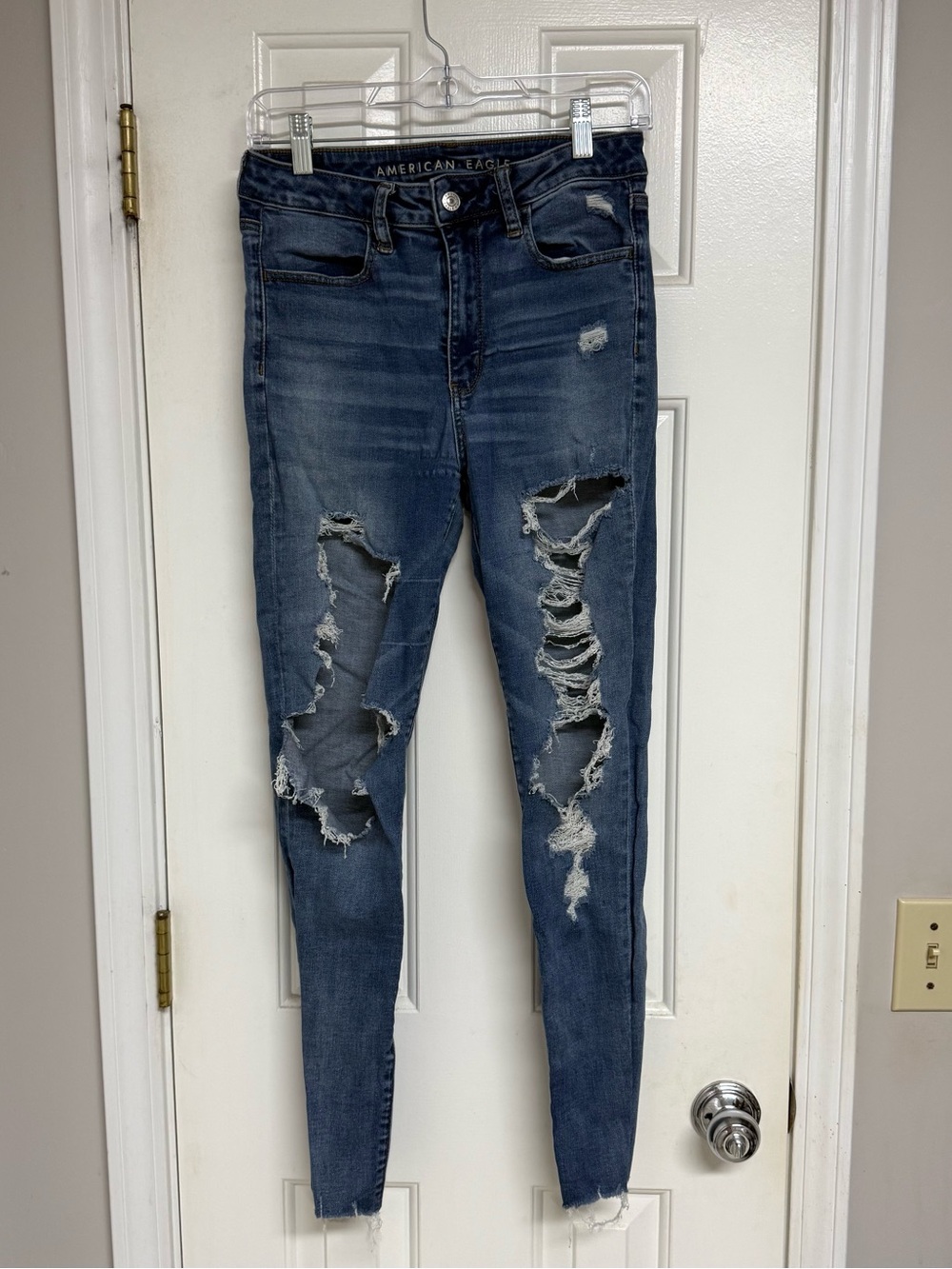 American Eagle Outfitters Distressed Skinny Jeans in Dark Blue
